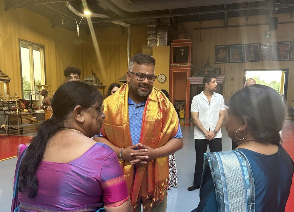 Ahsanul Hafiz being welcomed with a traditional shawl at a Tamil temple